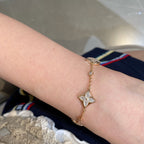 ¡®Imperial¡¯STAR AND SUN 4 MOTIF WHITE MOP PINK GOLD BRACELET
