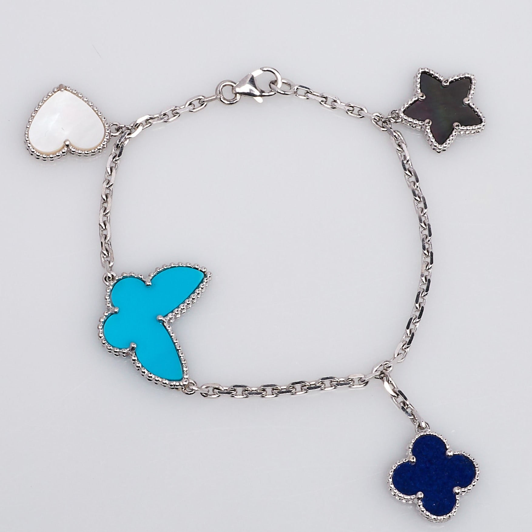 ¡®Imperial¡¯LUCKY SPRING SILVER BRACELET 4 MOTIF