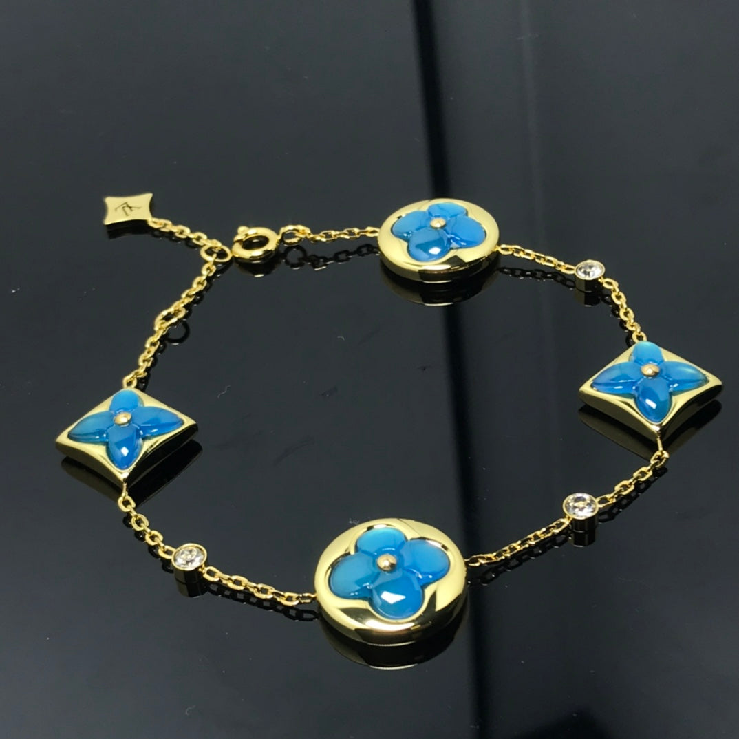 ¡®Imperial¡¯STAR AND SUN 4 MOTIF BLUE BRACELET